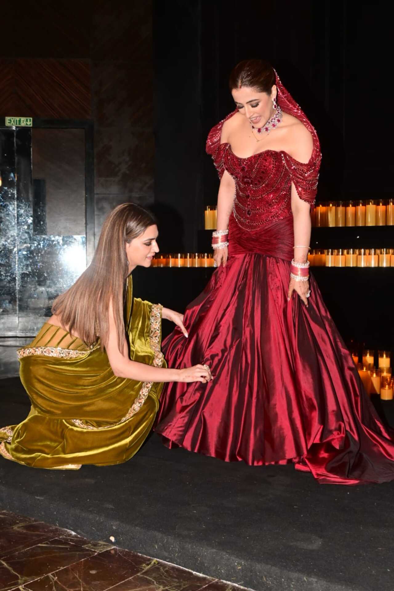 Kriti was seen fulfilling her bridesmaid duties, making sure her sister looked perfect on her big day.